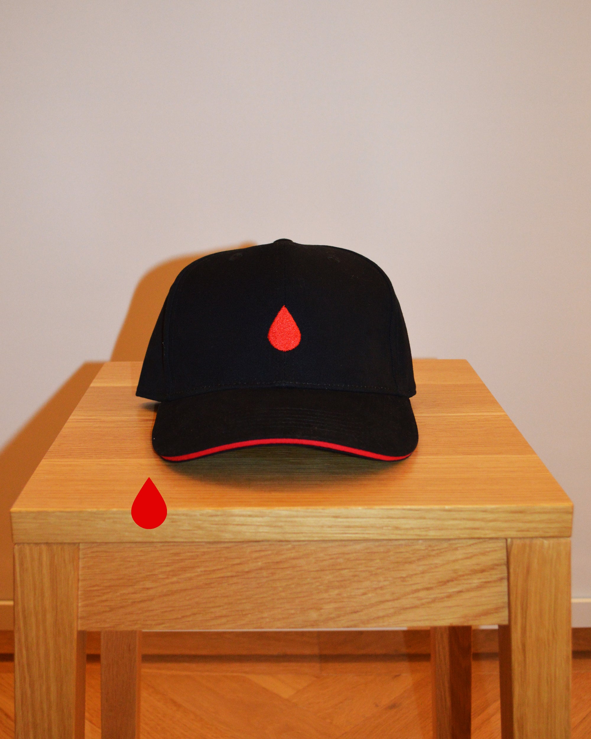 BLACK CAP | RED DROPLET